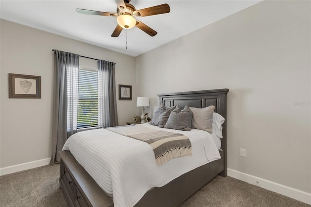 carpeted bedroom with baseboards and ceiling fan