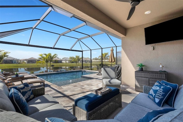 pool with a water view, a ceiling fan, an outdoor hangout area, a lanai, and a patio area