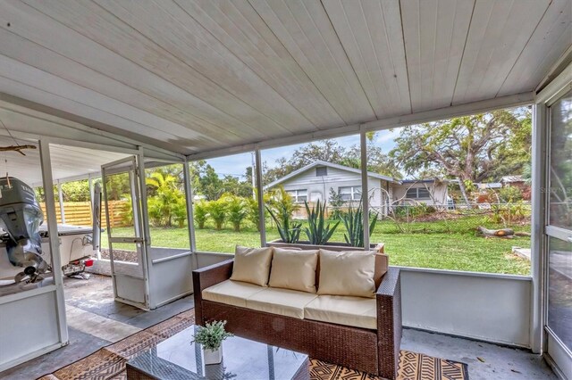 sunroom / solarium with wood ceiling