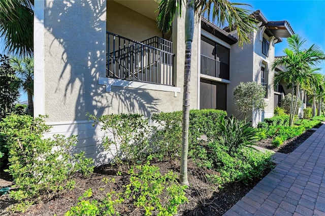 view of property exterior with stucco siding