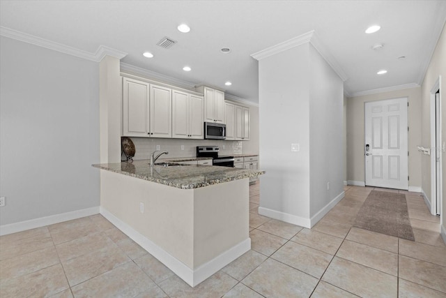 kitchen featuring visible vents, stone counters, decorative backsplash, appliances with stainless steel finishes, and crown molding