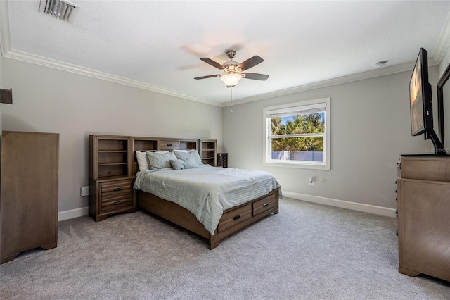 bedroom featuring baseboards, light carpet, and crown molding