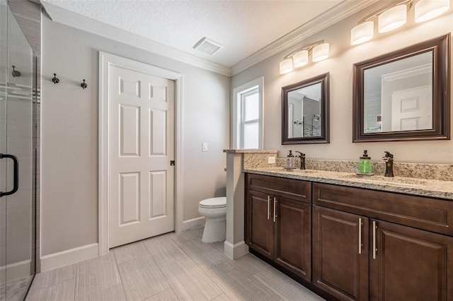 bathroom with visible vents, toilet, ornamental molding, a sink, and a shower stall