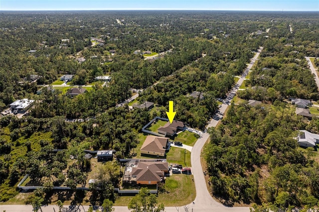 bird's eye view with a view of trees and a residential view