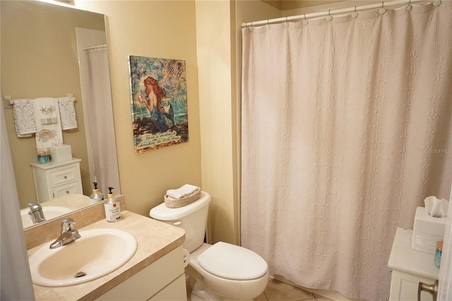 bathroom featuring vanity, tile patterned floors, toilet, and a shower with shower curtain