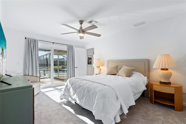 bedroom featuring access to exterior, visible vents, ceiling fan, and carpet