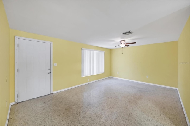 18348 Yale Ave, Port Charlotte, FL 33948 - empty room with baseboards, a ceiling fan, and speckle patterned floor