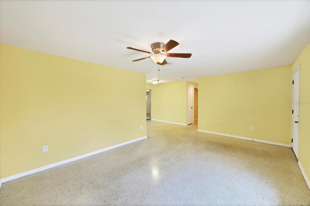18348 Yale Ave, Port Charlotte, FL 33948 - empty room with ceiling fan, speckled floor, and baseboards