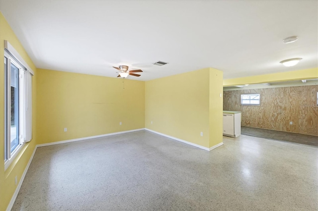 18348 Yale Ave, Port Charlotte, FL 33948 - spare room with ceiling fan, baseboards, speckled floor, and a smoke detector