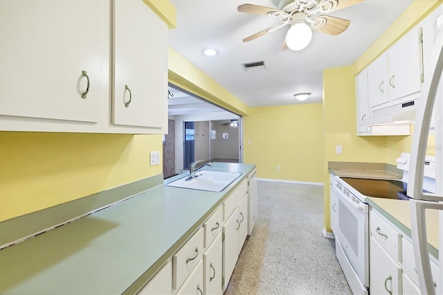 18348 Yale Ave, Port Charlotte, FL 33948 - kitchen featuring electric range, a sink, under cabinet range hood, ceiling fan, and white cabinets