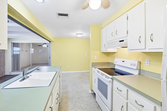 18348 Yale Ave, Port Charlotte, FL 33948 - kitchen featuring white range with electric stovetop, under cabinet range hood, a sink, and a ceiling fan