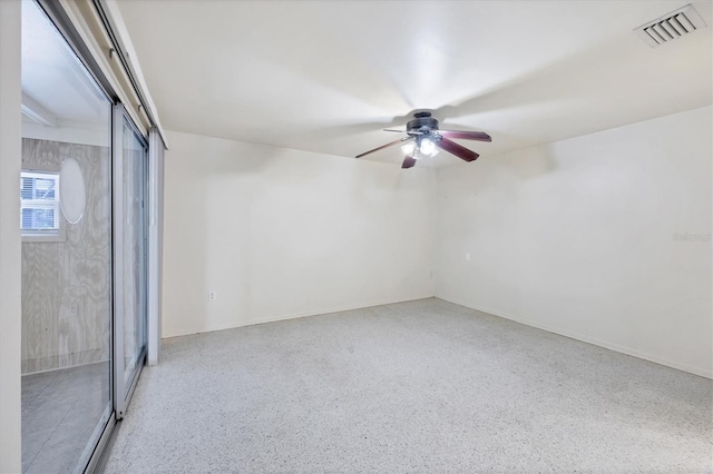 18348 Yale Ave, Port Charlotte, FL 33948 - unfurnished room with speckle patterned floor and a ceiling fan