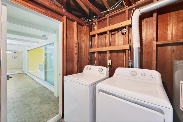 18348 Yale Ave, Port Charlotte, FL 33948 - washroom featuring washing machine and clothes dryer and water heater