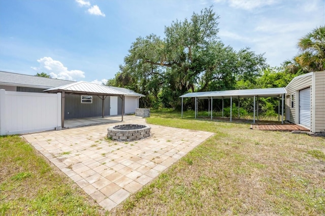 18348 Yale Ave, Port Charlotte, FL 33948 - view of grassy yard with a fire pit and a patio