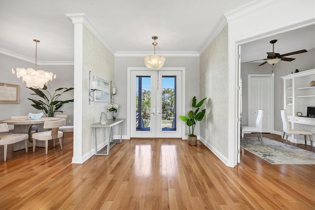 810 Siesta Dr, Sarasota, FL 34242 - entryway featuring light wood-style flooring, french doors, baseboards, ceiling fan, and crown molding