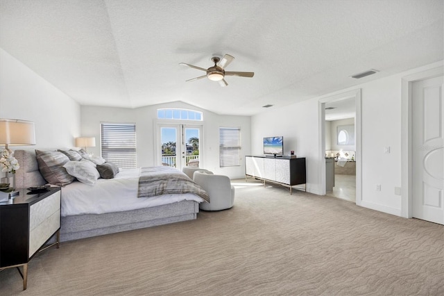 810 Siesta Dr, Sarasota, FL 34242 - bedroom featuring french doors, access to exterior, carpet floors, lofted ceiling, and ceiling fan