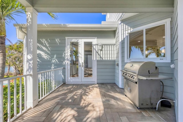 810 Siesta Dr, Sarasota, FL 34242 - wooden terrace featuring french doors