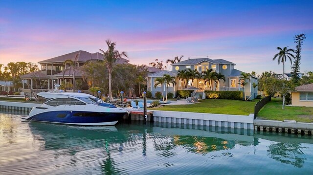 810 Siesta Dr, Sarasota, FL 34242 - dock featuring a water view and a lawn