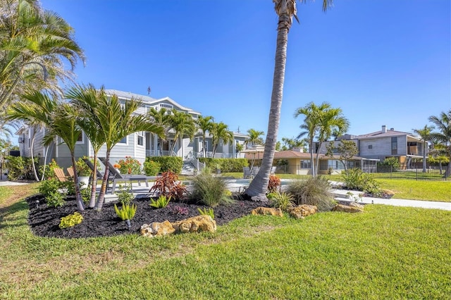 810 Siesta Dr, Sarasota, FL 34242 - surrounding community with a lawn and a residential view