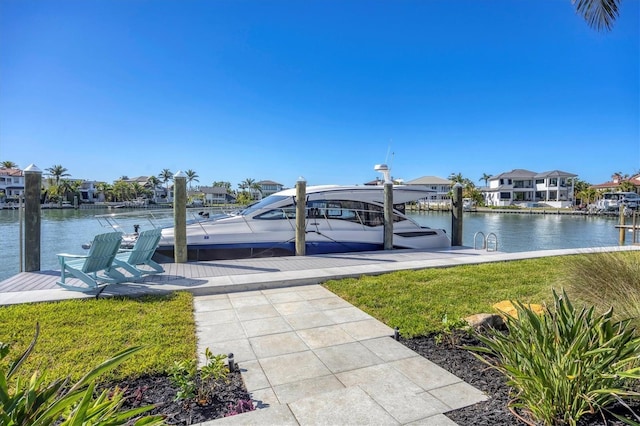 810 Siesta Dr, Sarasota, FL 34242 - dock with a water view, a residential view, and a lawn