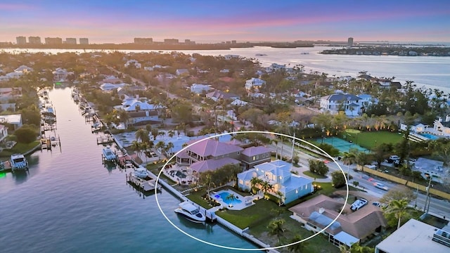 810 Siesta Dr, Sarasota, FL 34242 - aerial perspective of suburban area featuring a nearby body of water