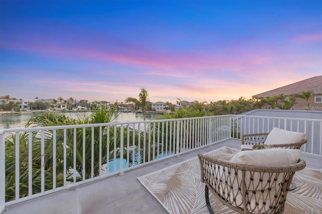 810 Siesta Dr, Sarasota, FL 34242 - balcony at dusk with a water view