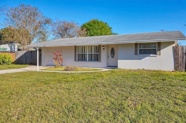 single story home featuring a front yard, fence, driveway, and stucco siding