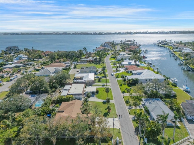 bird's eye view with a residential view and a water view