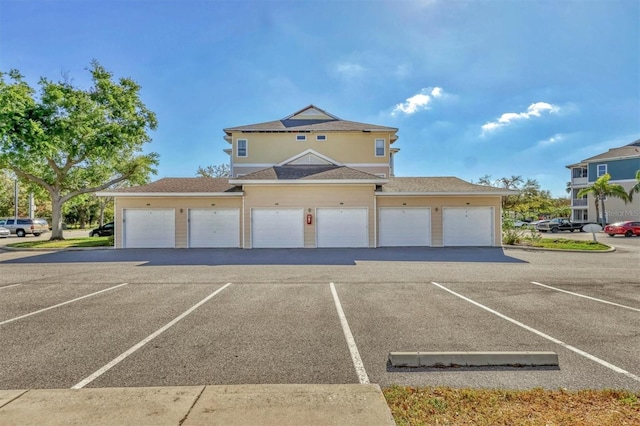 exterior space featuring community garages