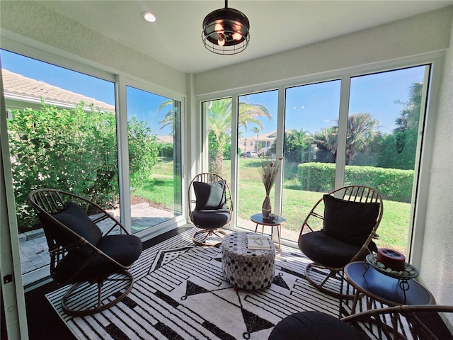 sunroom featuring a healthy amount of sunlight