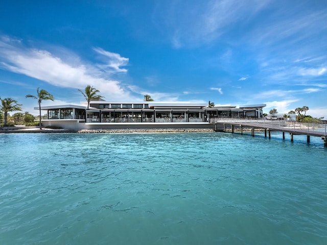 view of swimming pool with a water view