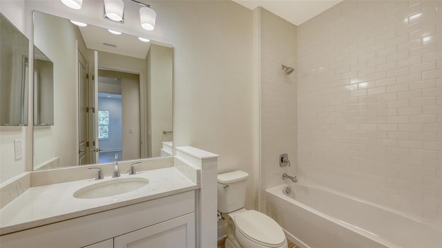 full bath featuring visible vents, toilet, vanity, and bathtub / shower combination