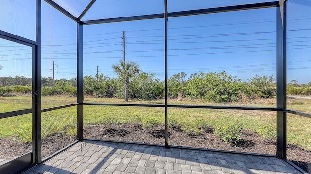 unfurnished sunroom featuring plenty of natural light