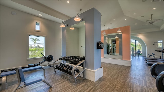 gym featuring a wealth of natural light, a ceiling fan, high vaulted ceiling, and recessed lighting