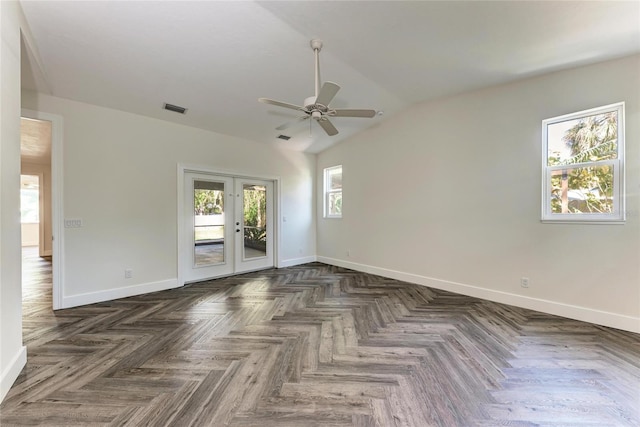 unfurnished room with baseboards, french doors, visible vents, and ceiling fan