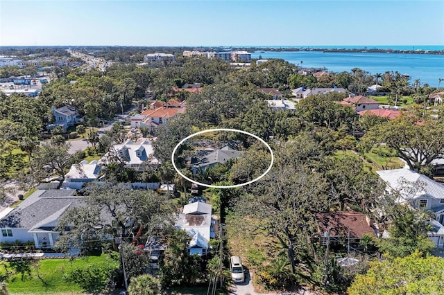 bird's eye view with a residential view and a water view