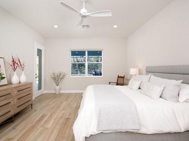 bedroom featuring light wood-type flooring, visible vents, baseboards, and recessed lighting