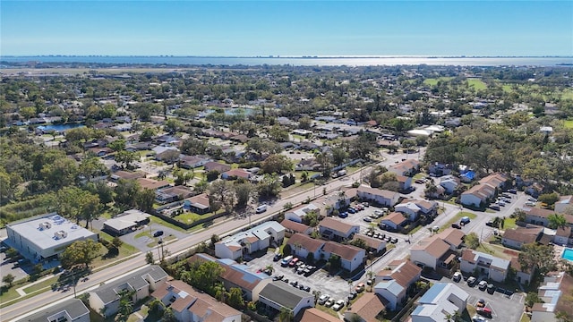 bird's eye view featuring a residential view and a water view