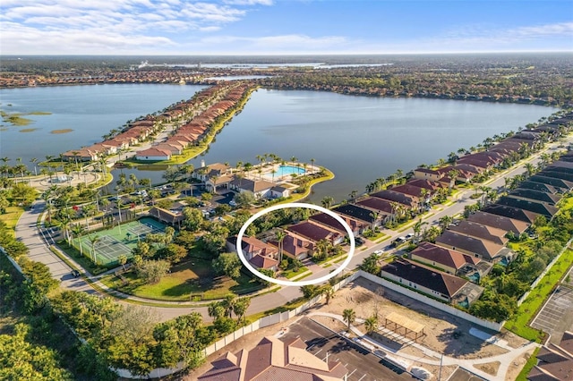 aerial view featuring a water view and a residential view