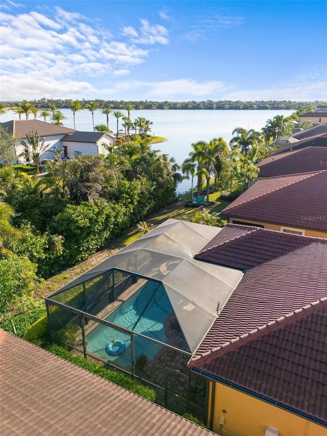 birds eye view of property featuring a water view