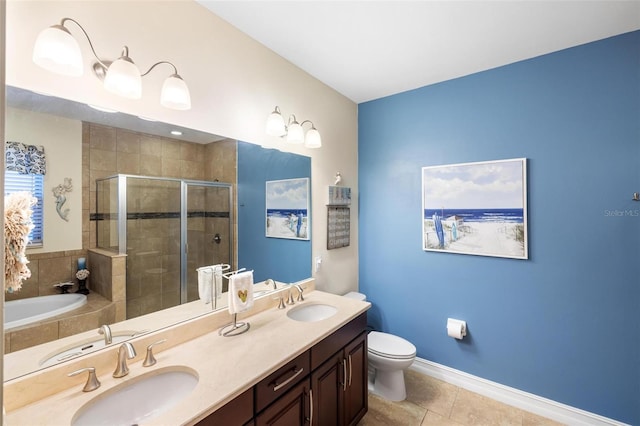 full bathroom featuring a shower stall, tile patterned floors, and a sink