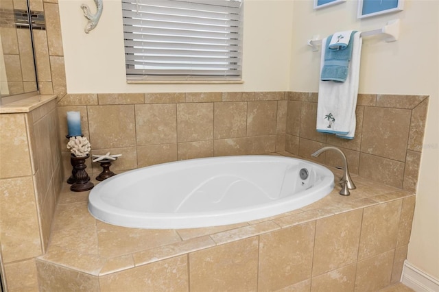 bathroom featuring a garden tub