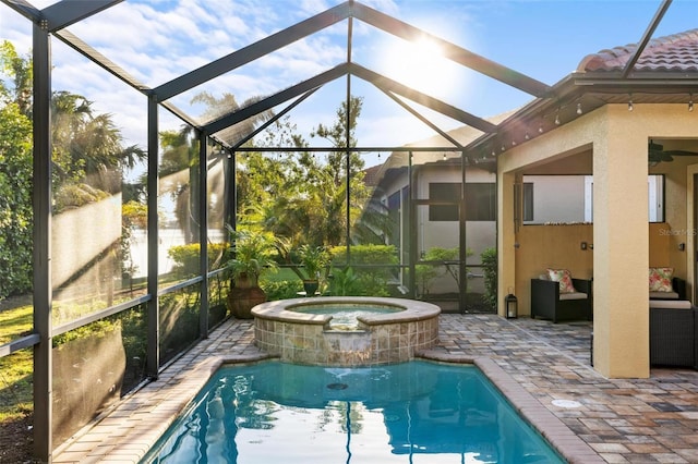 outdoor pool with a lanai and a patio