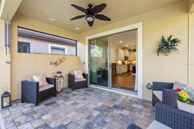 view of patio with a ceiling fan