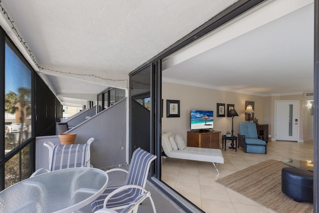 balcony featuring visible vents and outdoor dining space