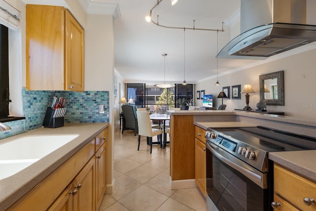 kitchen featuring stainless steel electric range oven, wall chimney exhaust hood, crown molding, and open floor plan