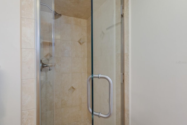 full bath featuring a stall shower