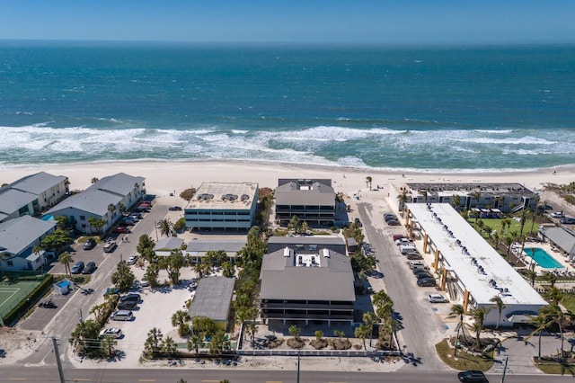 bird's eye view with a water view and a view of the beach