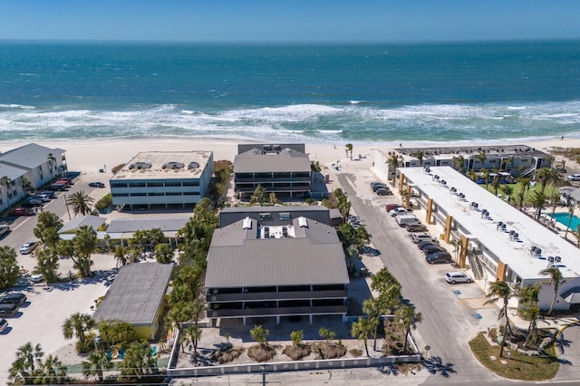 bird's eye view featuring a beach view and a water view