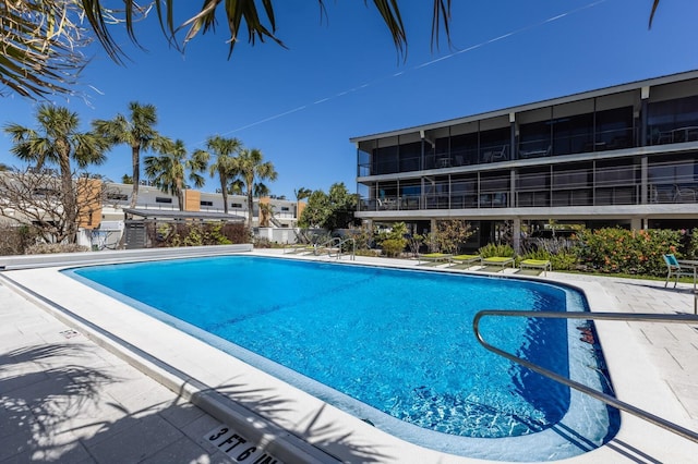 pool with a patio